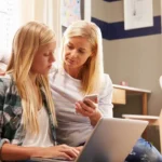 A mother gently guiding her daughter to make a better choice.