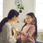 A mutual happy bonding between a mother and her daughter.