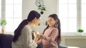 A mutual happy bonding between a mother and her daughter.