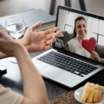 A long-distance couple on a video call - what kills long-distance relationships